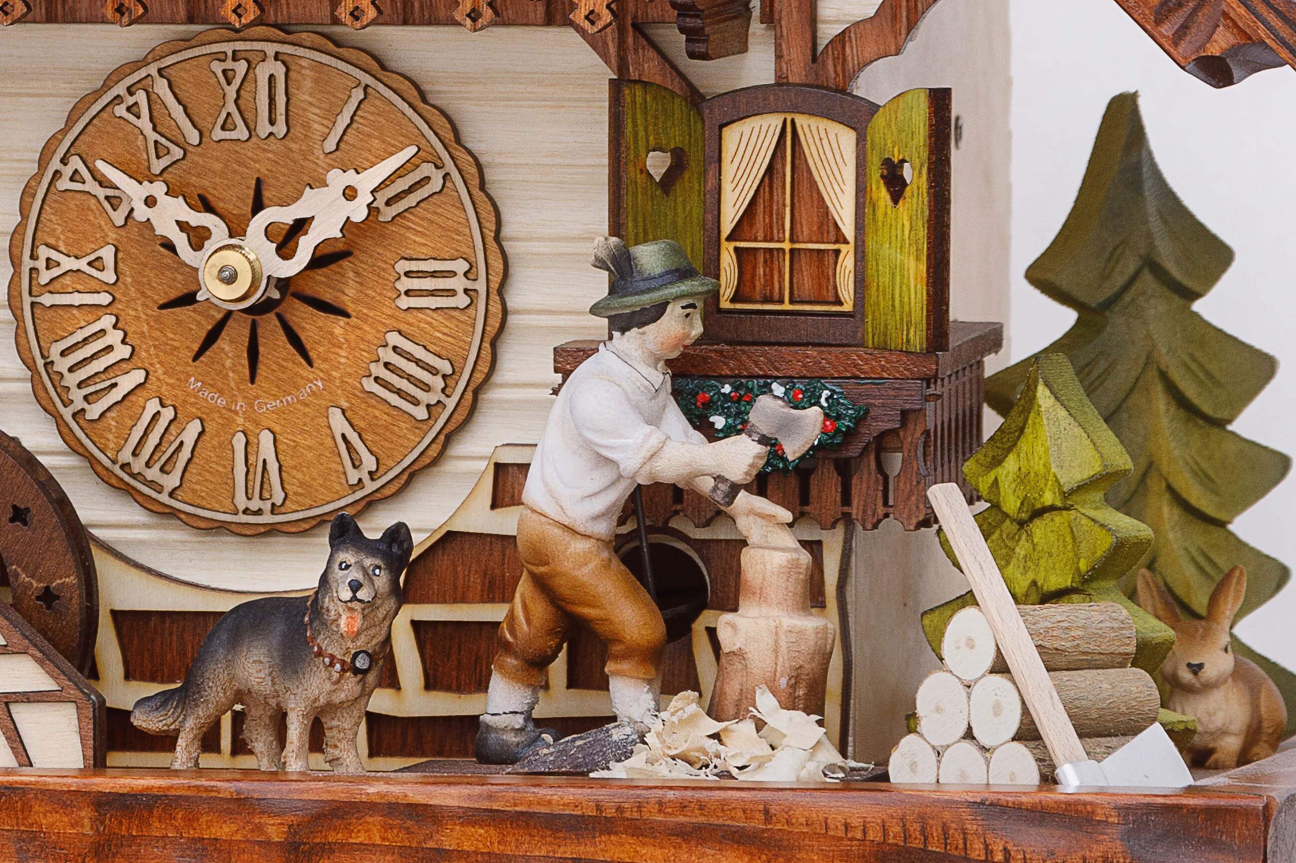 Hekas -Kuckucksuhr 1-Tag Laufwerk Musik Haus Holzhacker 32cm- 3712 EX