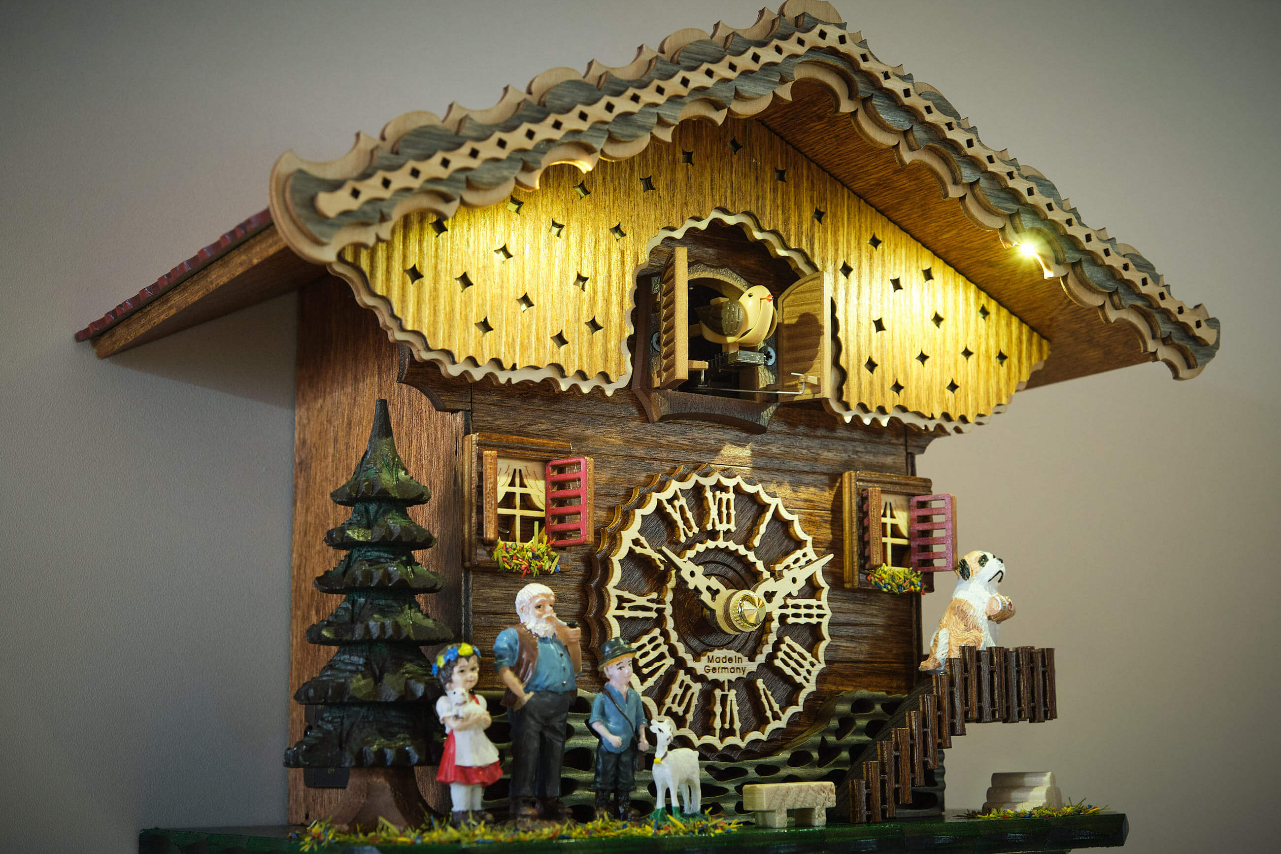 Trenkle -Cuckoo Clock Quartz Movement Black Forest House Heidi with illumination 24cm- 7204 QM HZZG