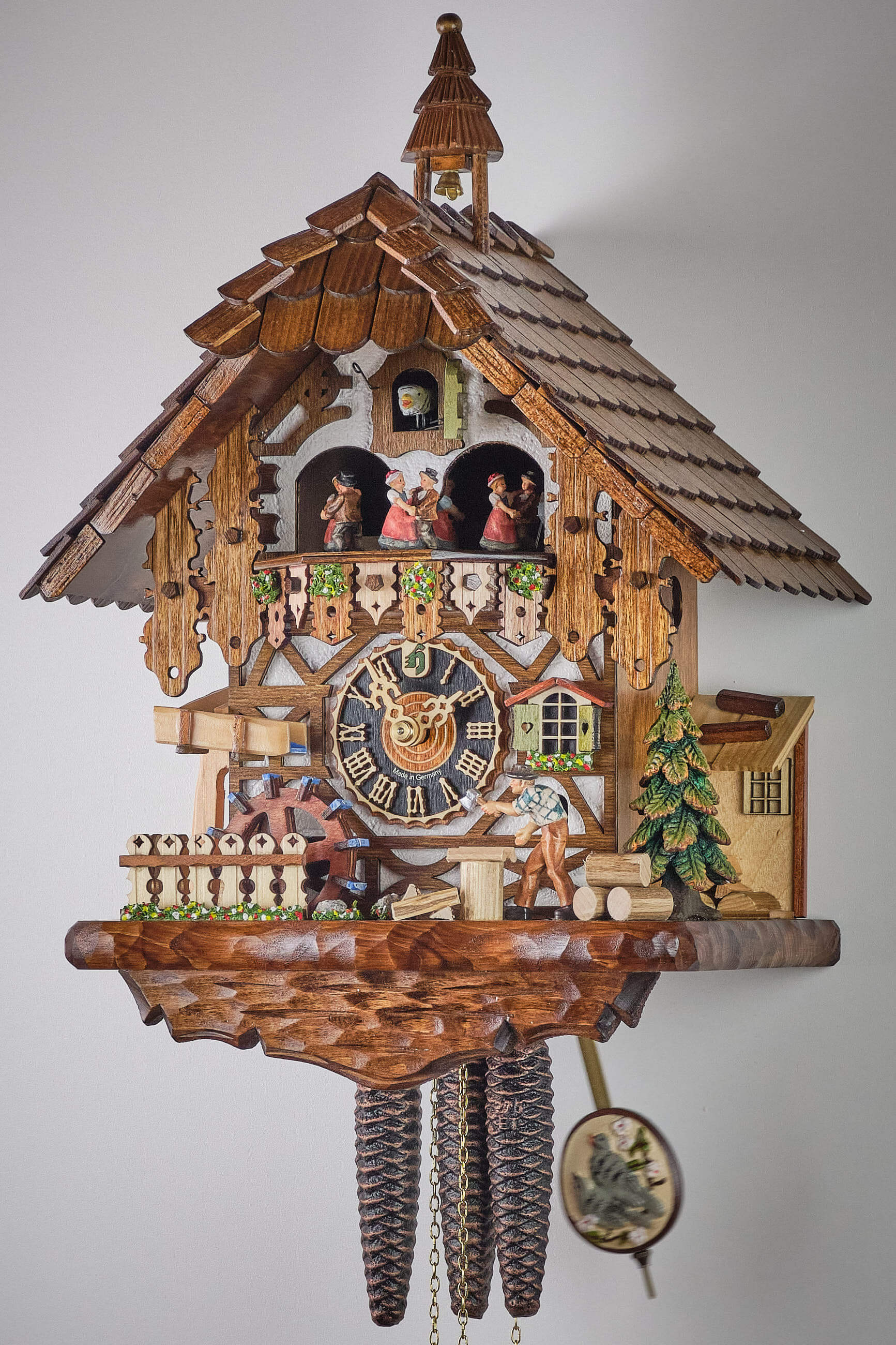 Hönes -Cuckoo clock 1-day movement with music house wood chopper 41cm- 6218T