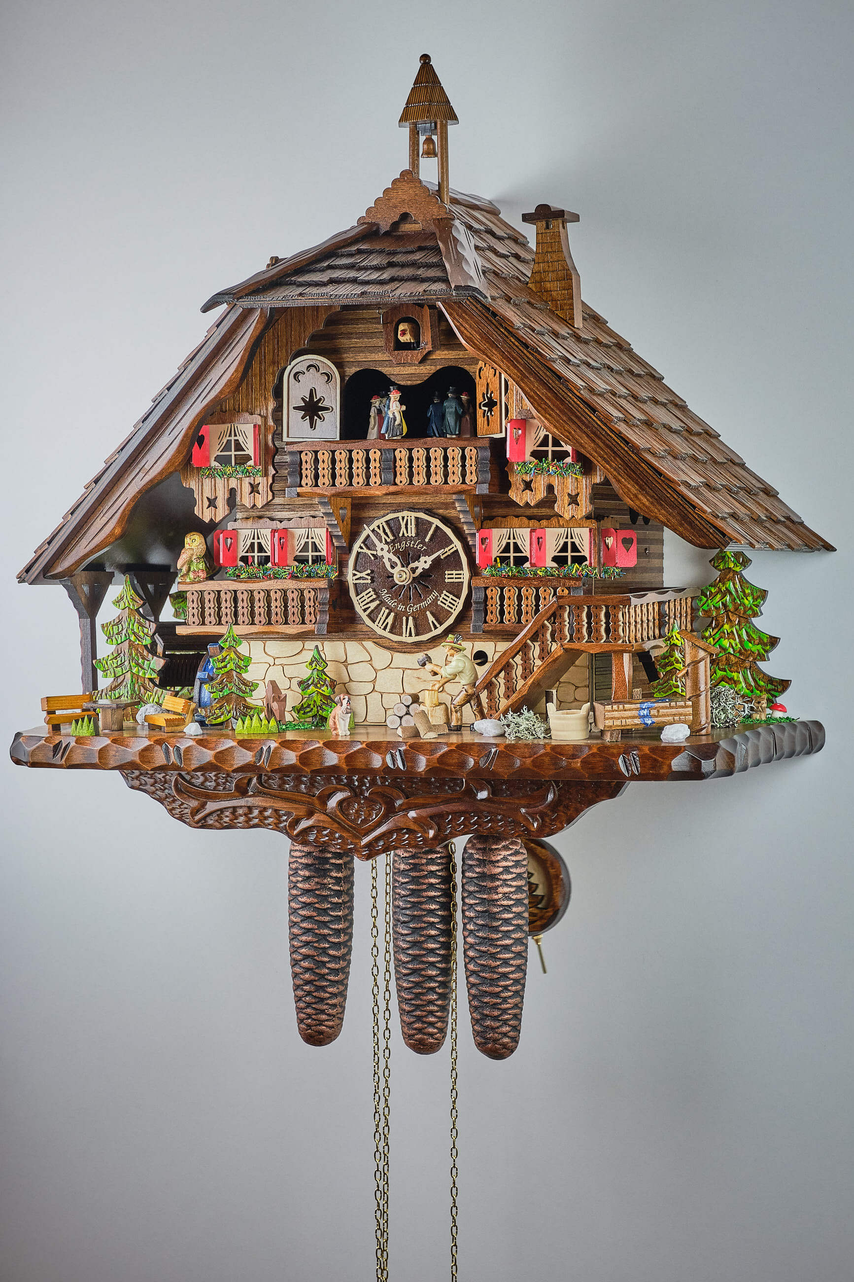 Engstler -Kuckucksuhr 8-Tage Laufwerk Musik Holzhacker Haus 54cm- 4891/8 MT