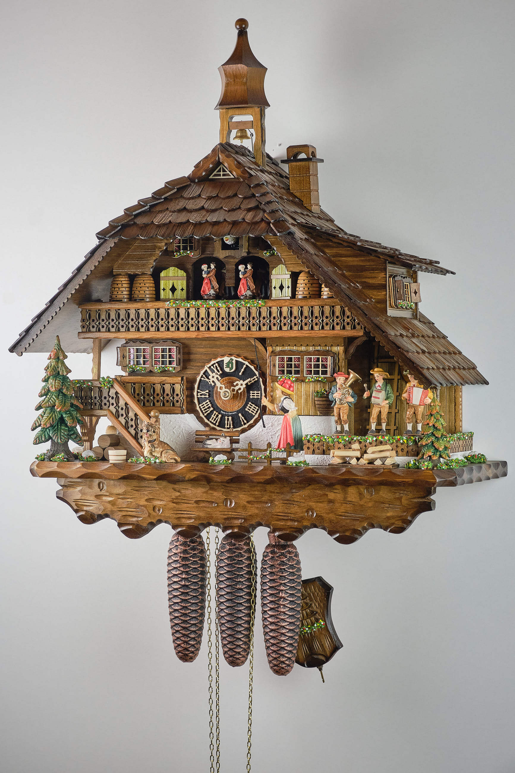 Hönes -Cuckoo Clock 8-Day Movement with Music House Musicians 59cm- 8680T