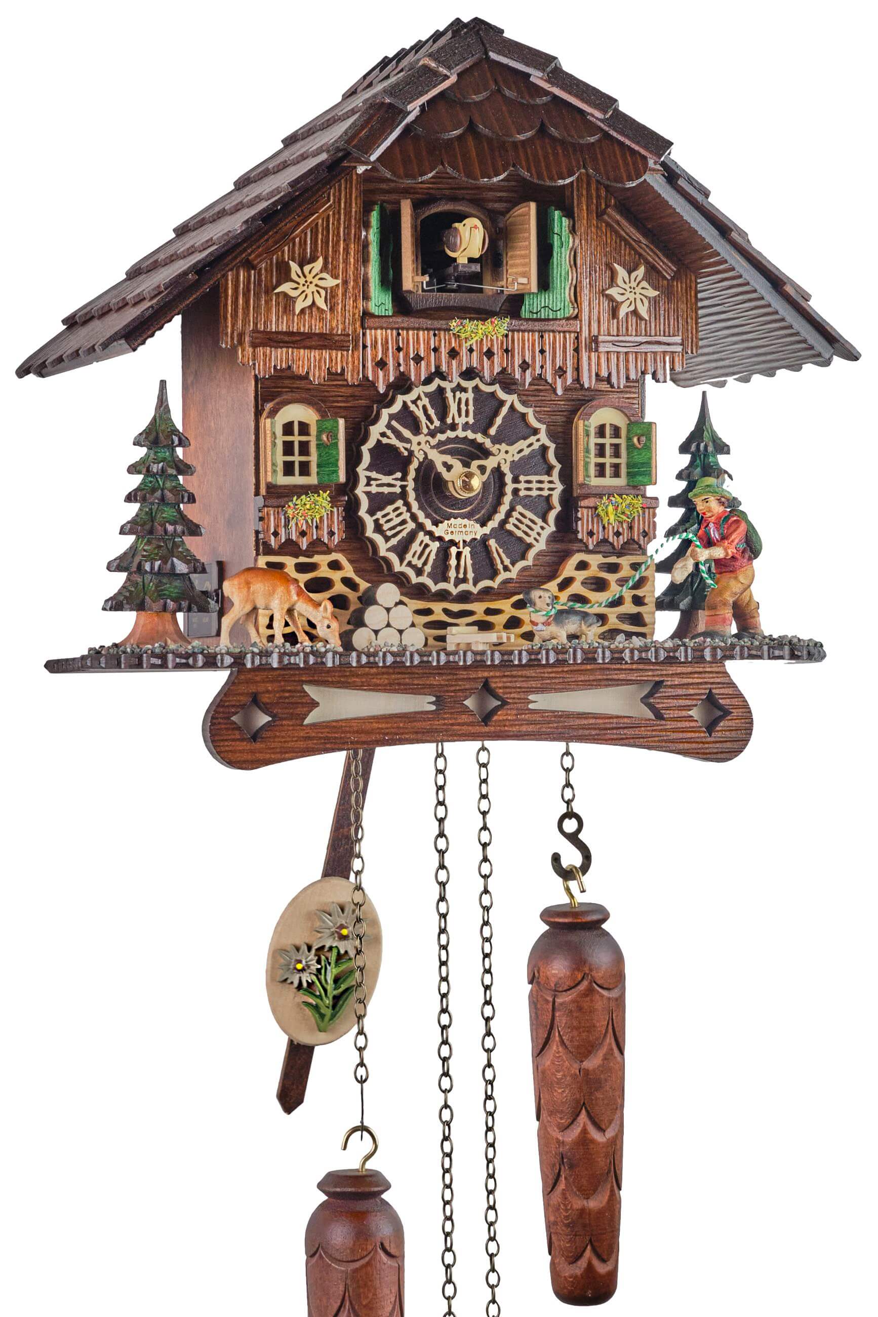 Trenkle -Cuckoo Clock Quartz Movement Black Forest House Wanderer with illumination 26cm- 7200 QM HZZG