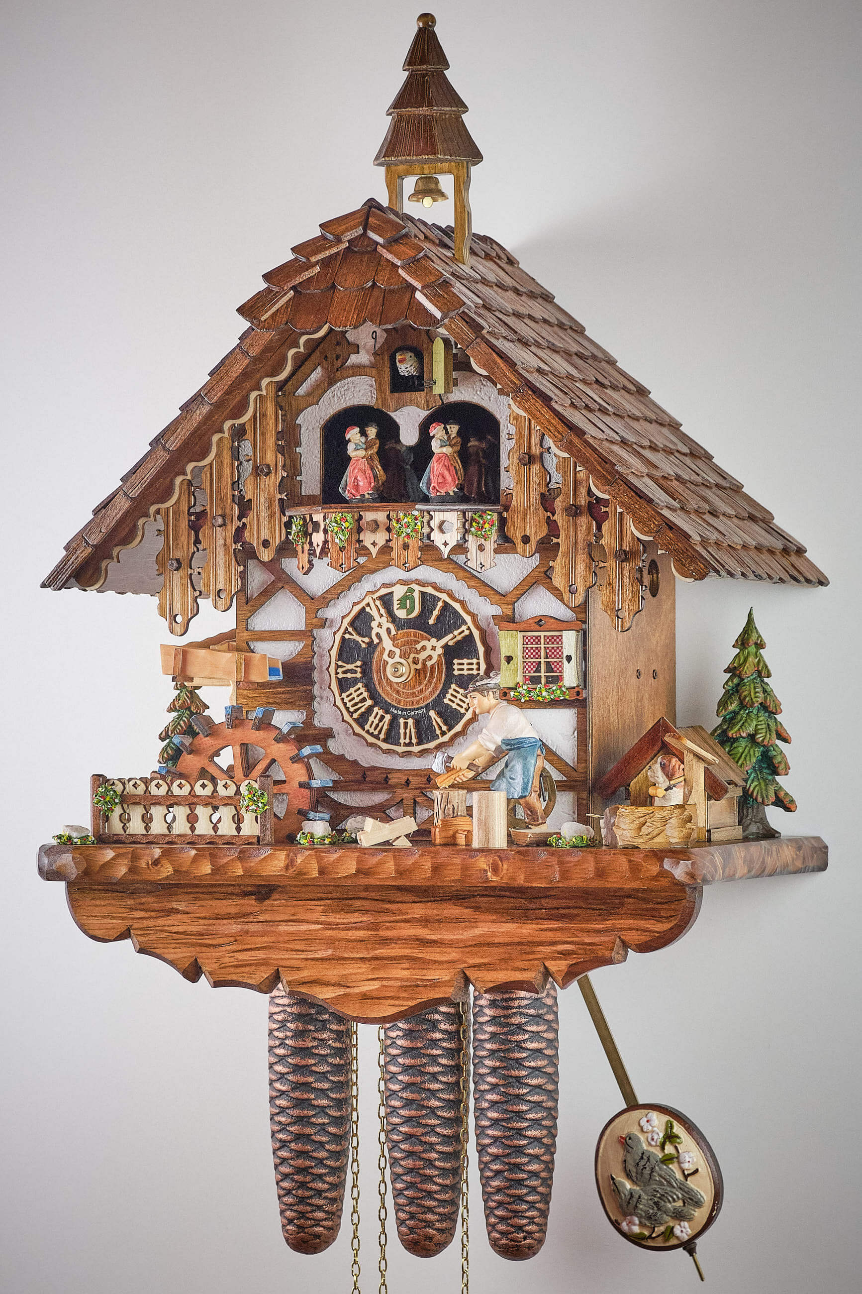Hönes -Cuckoo Clock 8-Day Movement with Music House Wood Chopper 52cm- 86218T