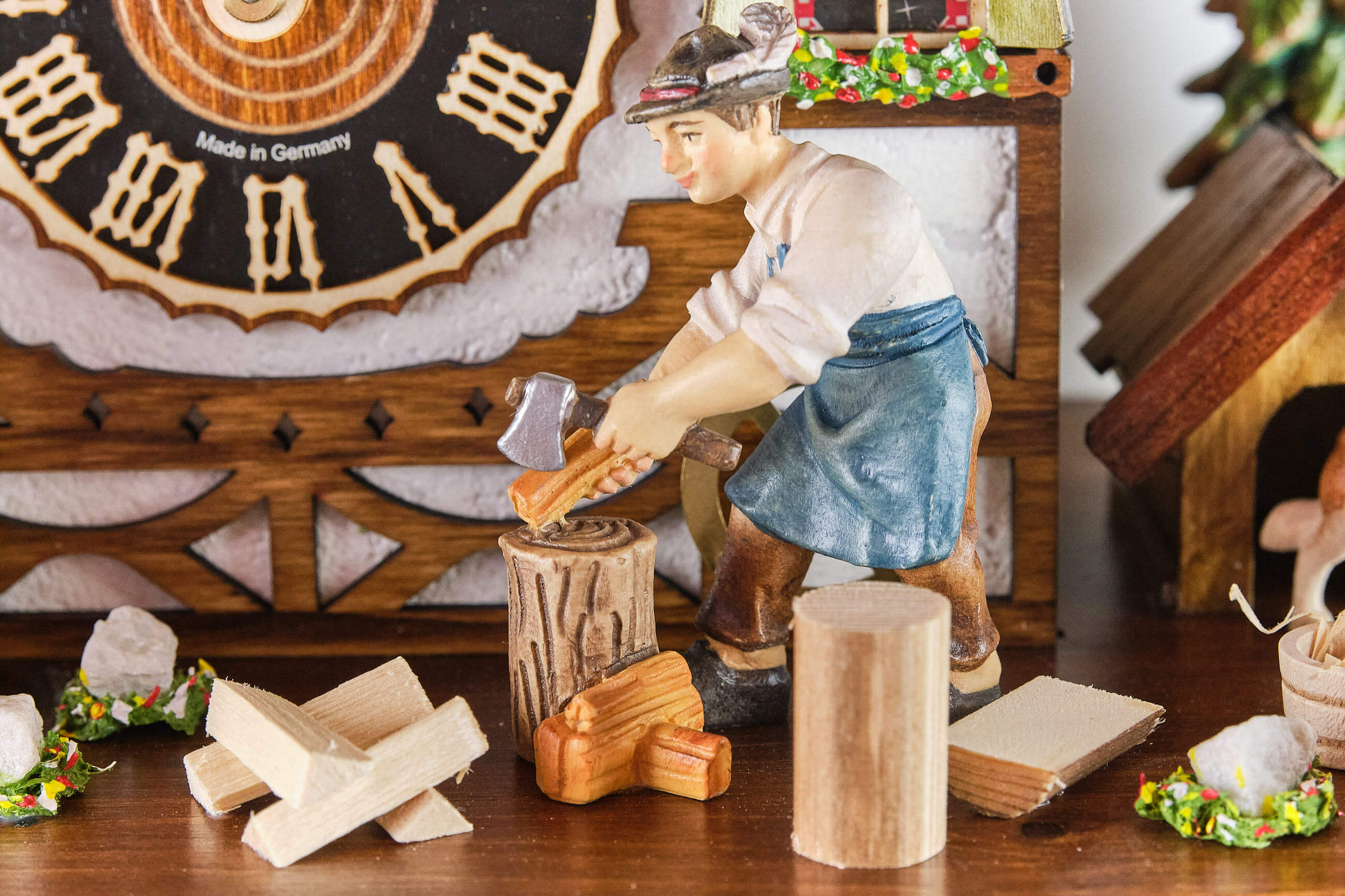 Hönes -Cuckoo Clock 8-Day Movement with Music House Wood Chopper 52cm- 86218T