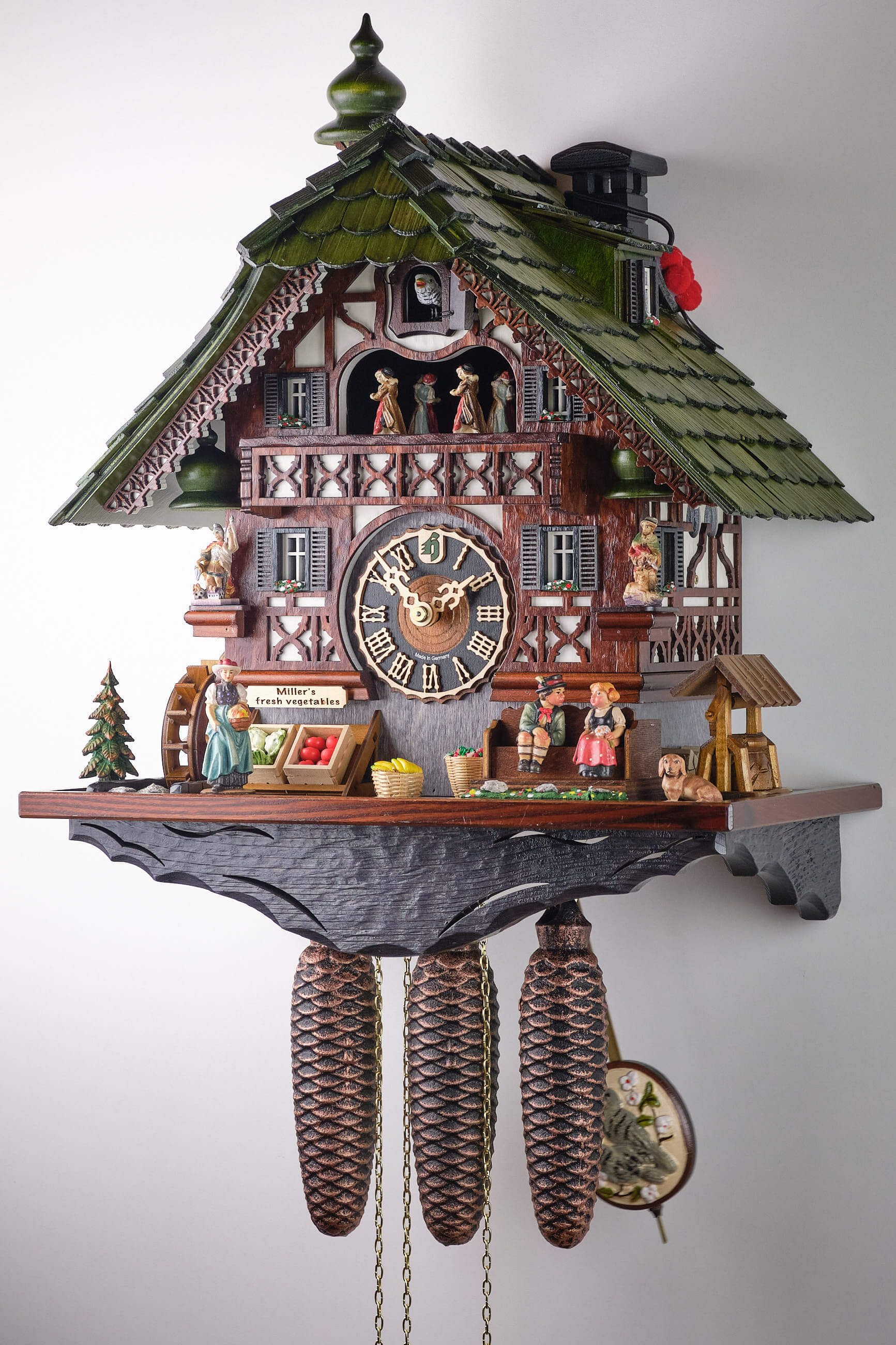 Hönes -Cuckoo clock 8 days movement music black forest house kissing couple 48cm- 86770T