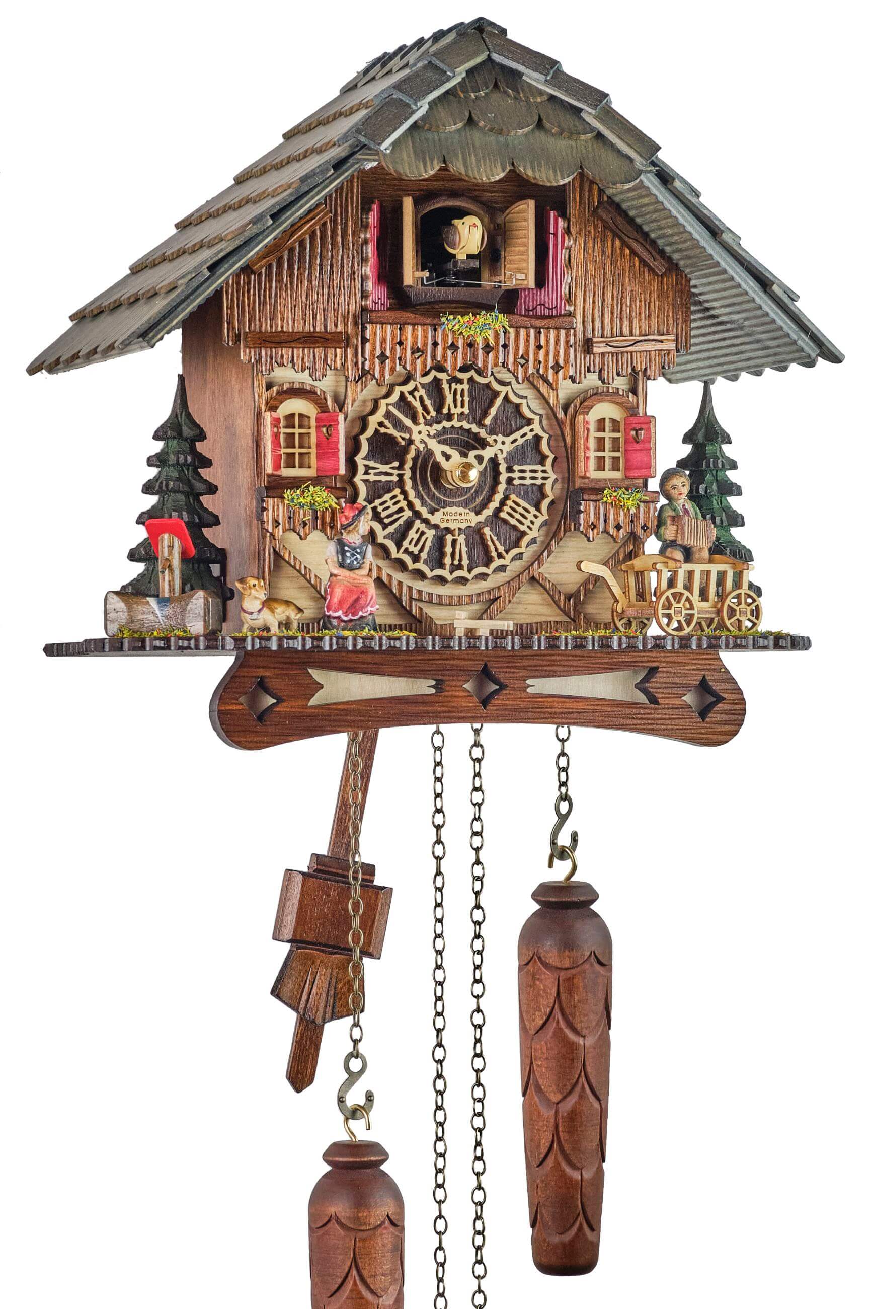 Trenkle -Cuckoo Clock Quartz Movement Black Forest House Black Forest Woman with illumination 26cm- 7205 QM HZZG