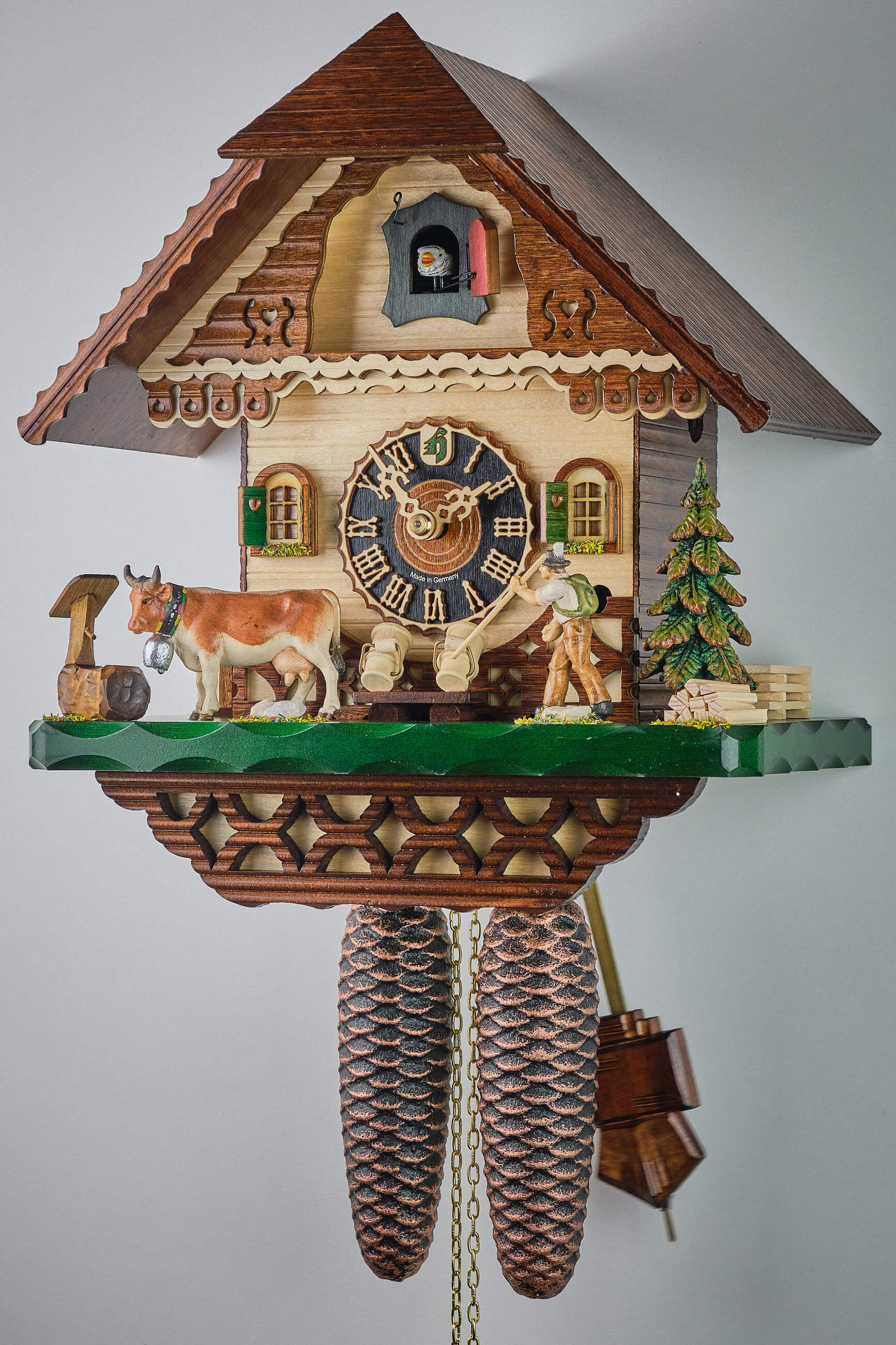 Hönes -Kuckucksuhr Schwarzwaldhaus mit Wanderer 8-Tage Laufwerk 32cm- 8240