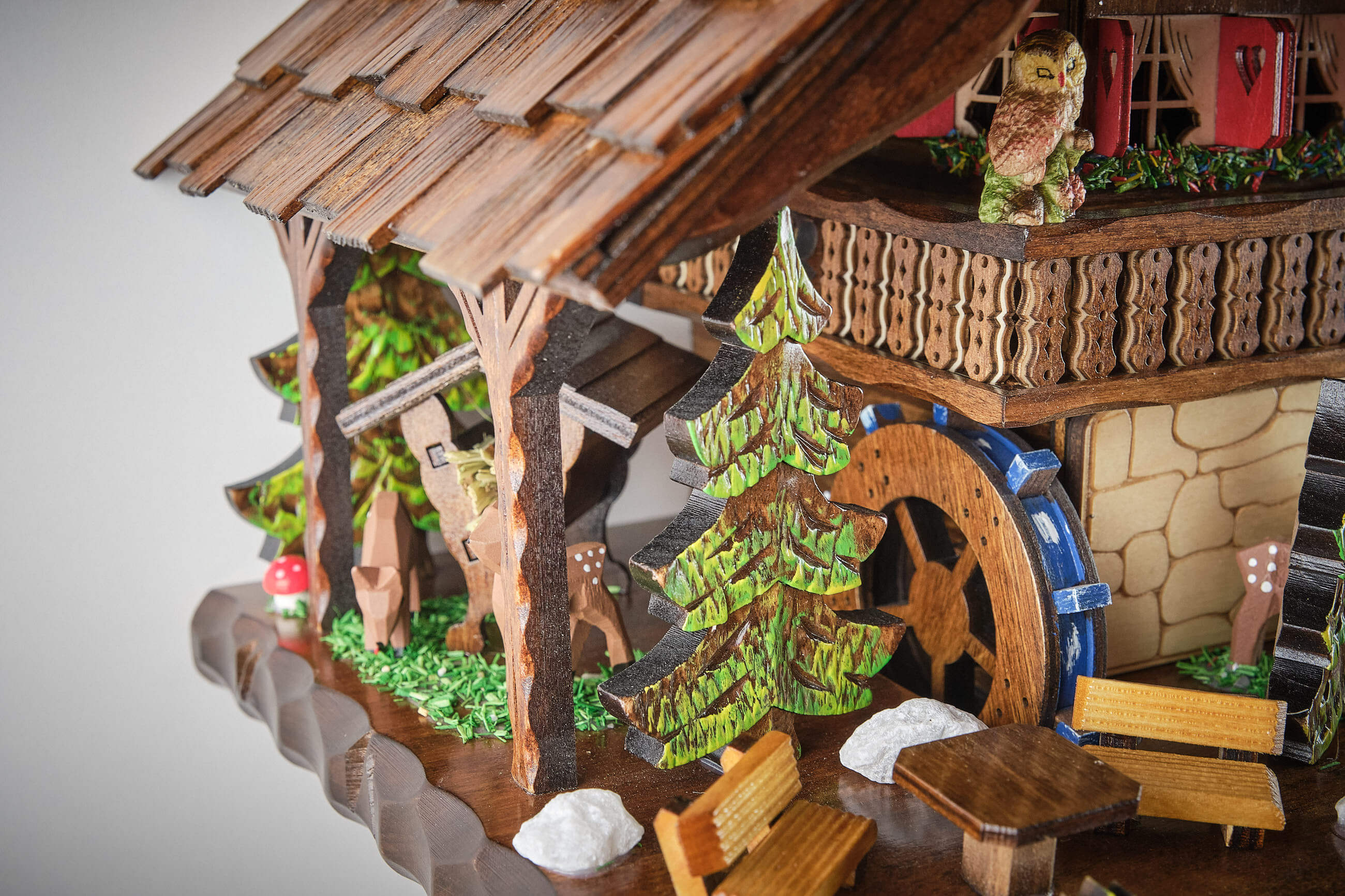 Engstler -Kuckucksuhr 8-Tage Laufwerk Musik Holzhacker Haus 54cm- 4891/8 MT